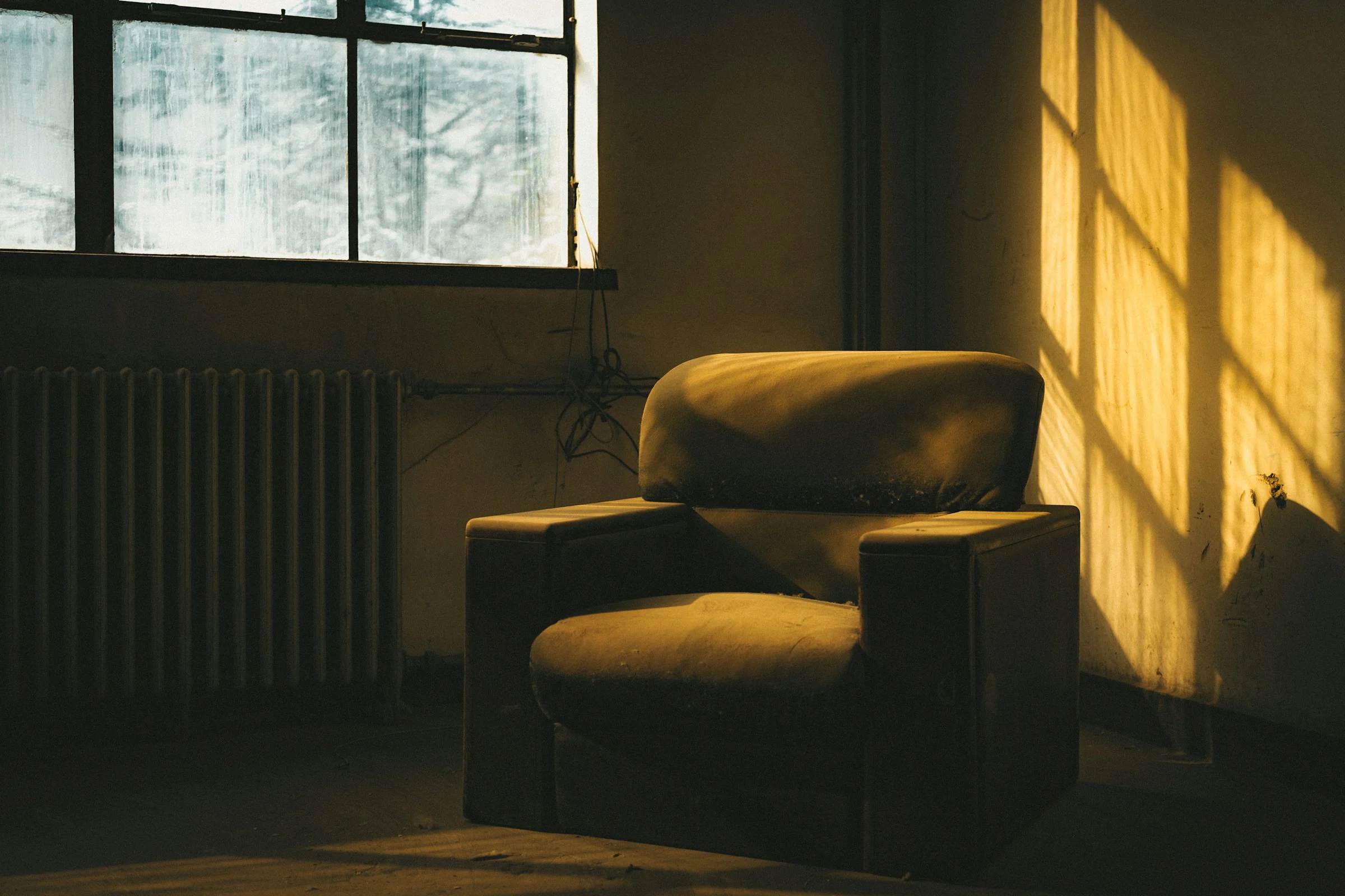 An armchair in warm afternoon sunlight